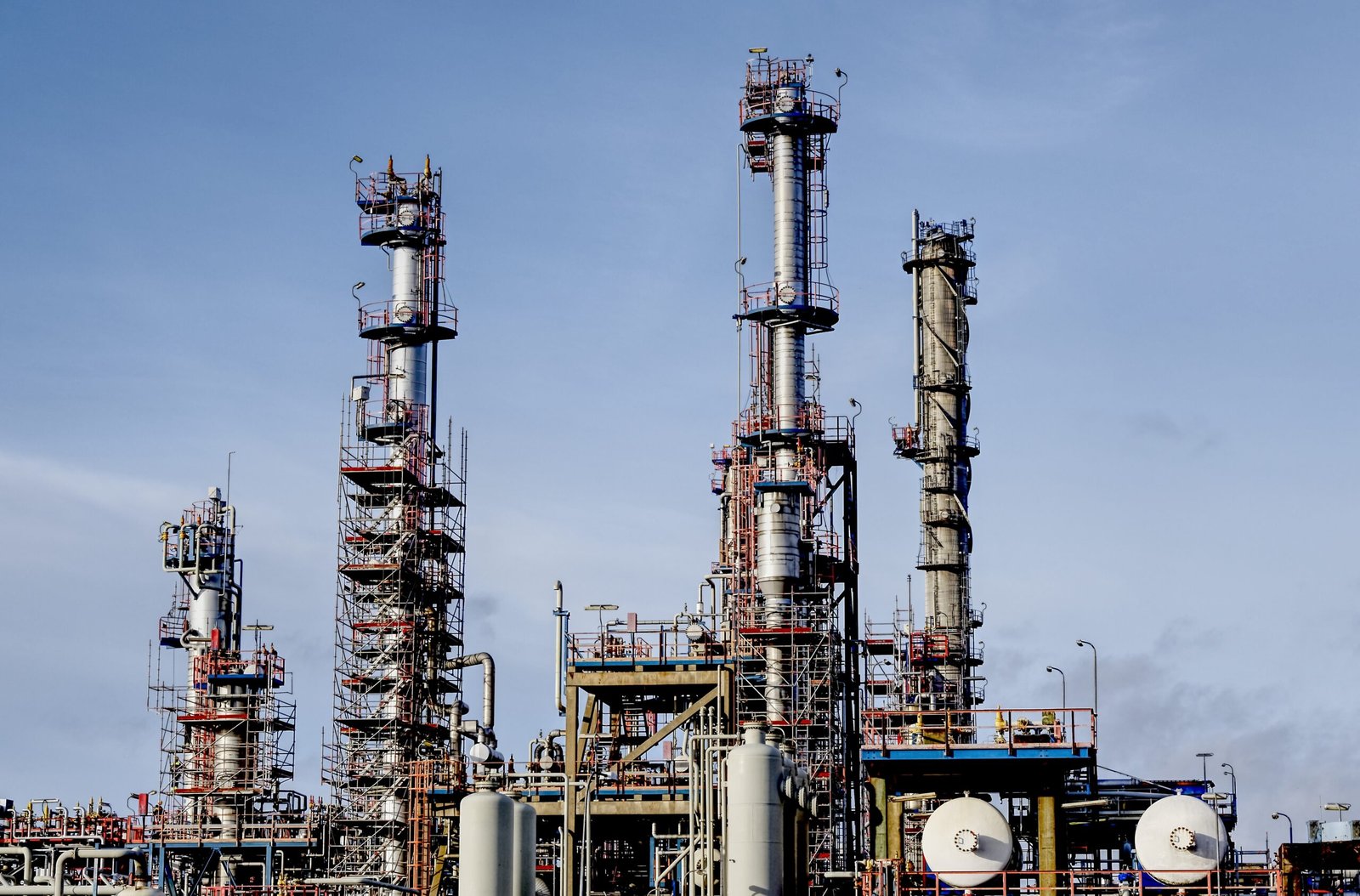 A modern factory in an industrial zone under a blue sky - a cool picture for presentations
